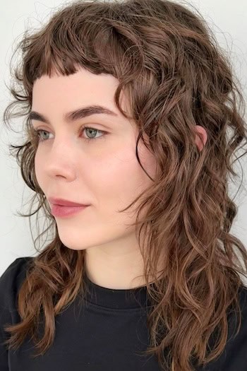 Wavy Shag with Micro Bangs Haircut