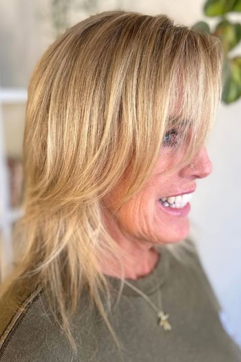 Feathered Wispy Layers With Bangs Hairstyle