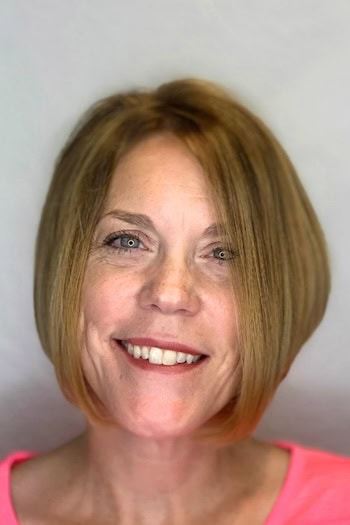 Soft Chin-Length Tapered Bob With Center Part Hairstyle