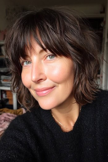 Tousled Choppy Waves with Piecey Bangs Haircut