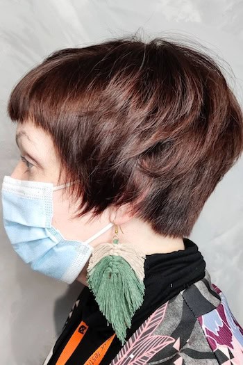 Short Layers with Bangs Hairstyle, side view.