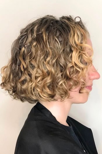 Short Curly Bob Hairstyle, side view.