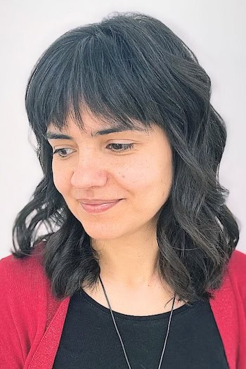 Shoulder-Length Wavy Shag with Bangs Haircut