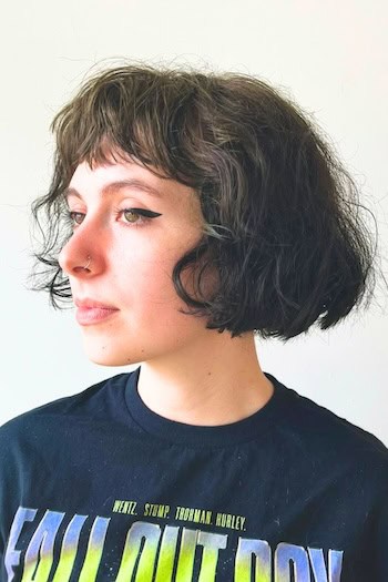 Tousled Wavy Bob With Bangs Hairstyle