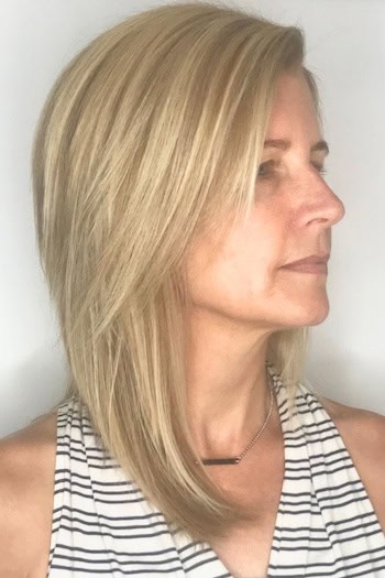 Medium Layered Hair With Side-Swept Front Hairstyle