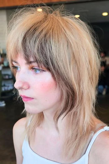 Medium Shag with Peekaboo Lowlights Haircut
