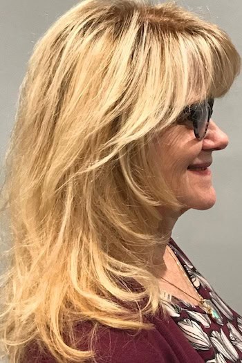 Medium Layers With Bangs Hairstyle