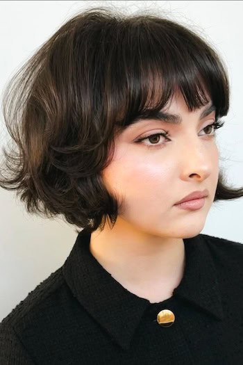 Short Wavy Bob with Bangs Hairstyle