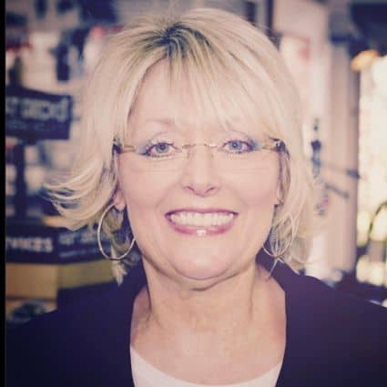 Short Layered Bob With Bangs And Flipped Ends Hairstyle