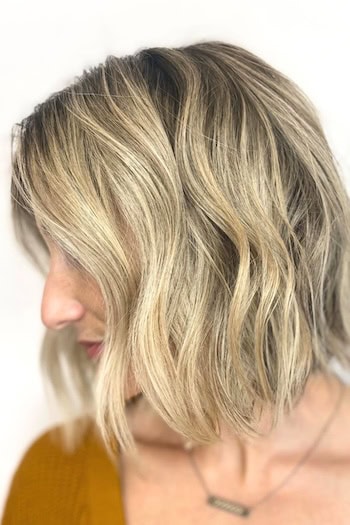 Wavy Blonde Textured Bob Hairstyle, side view.