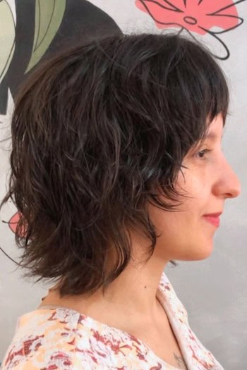 Brunette Textured Shag Haircut, side view.