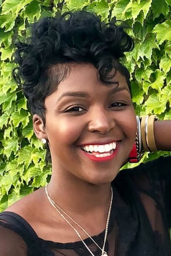 Curly Pixie Cut with Voluminous Top Hairstyle