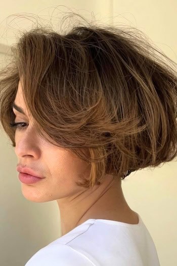 Short Side-Swept Brunette Bob With Volume Hairstyle
