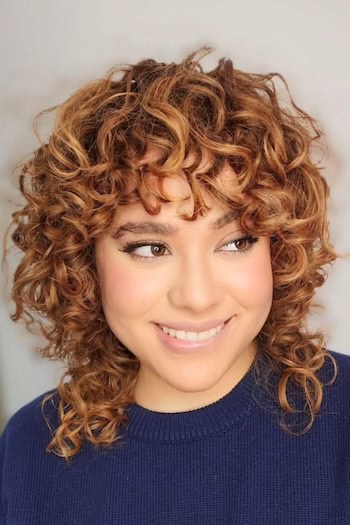 Curly Layered Shag with Fringe Haircut