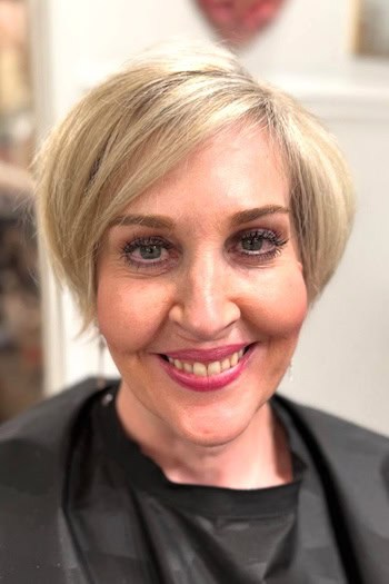 Short Tapered Bob With Soft Side Part Hairstyle