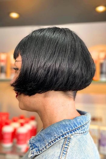 Ultra-Short Bob With Bangs Hairstyle, side view.