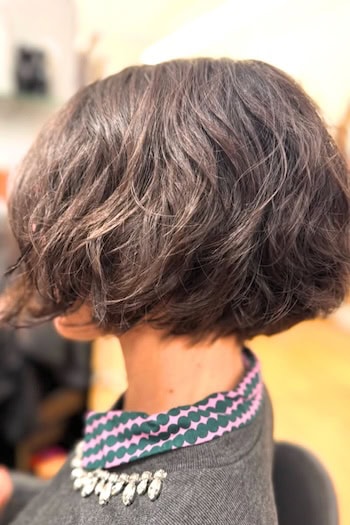 Short Textured Bob With Soft Waves Hairstyle, side view.
