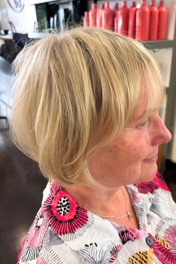 Layered Blonde Bob With Soft Bangs Hairstyle