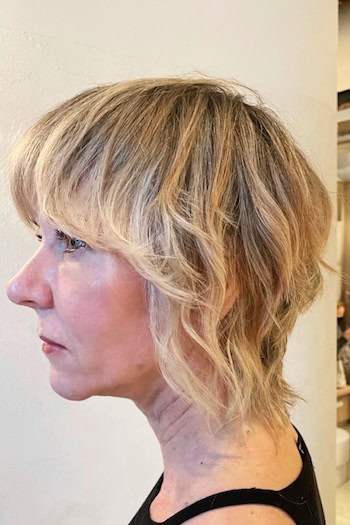 Short Wavy Shaggy Cut with Bangs Hairstyle