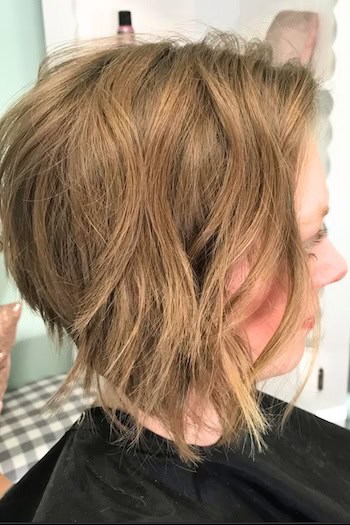 Cropped Wash-And-Wear Waves Hairstyle with angle, side view.