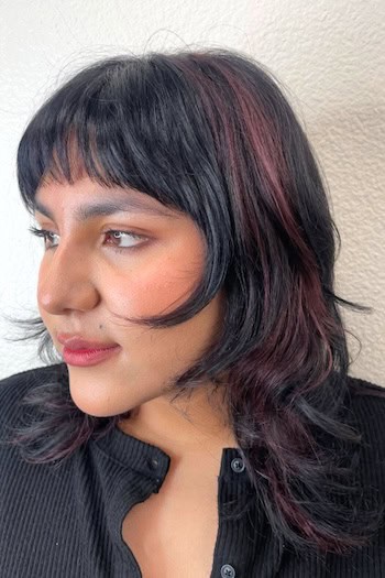Textured Shag With Curled Tips And Bangs Haircut