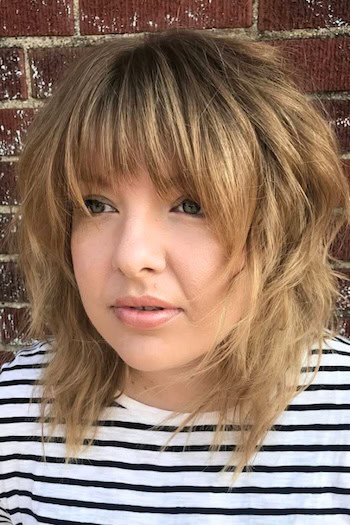 Wavy Medium Shag With Heavy Fringe Haircut