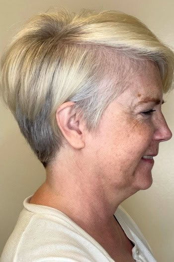 Layered Blonde Pixie With Side Sweep Hairstyle