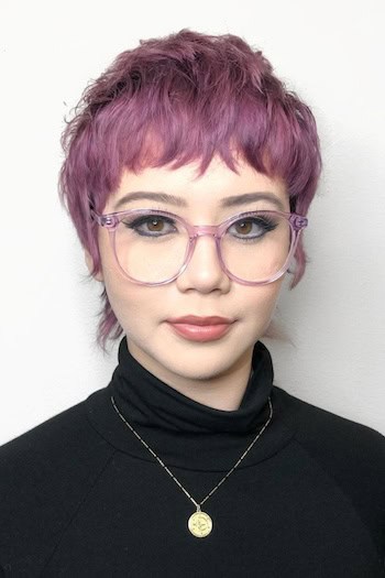 Purple Pixie Hairstyle with shaggy layers.
