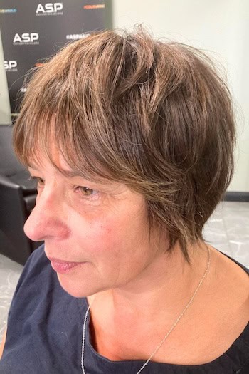 Short Brunette Shag with Blended Layers and Bangs Hairstyle