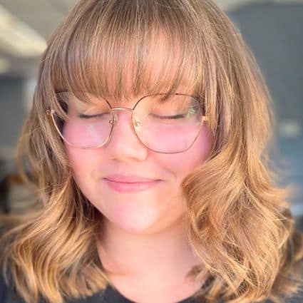 Bouncy Layered Long Bob With Bangs Haircut