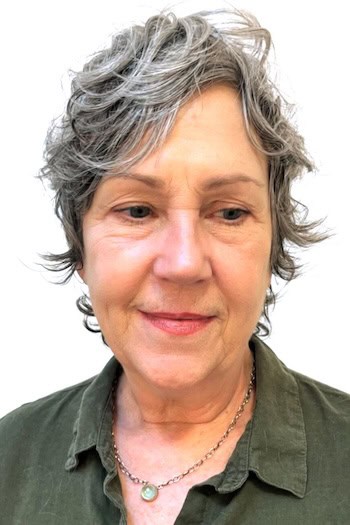 Curly Shaggy Pixie with Side-Swept Bangs Hairstyle