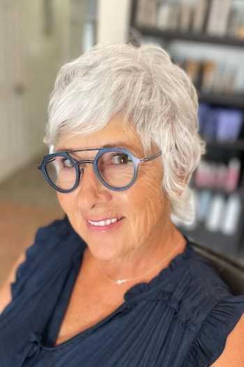 Short Silver White Shag with Sweeping Bangs Hairstyle