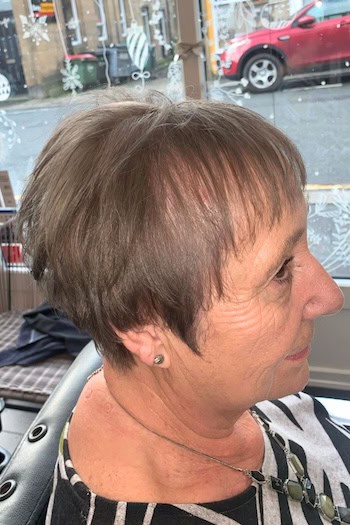Short Layered Crop With Wispy Bangs Hairstyle