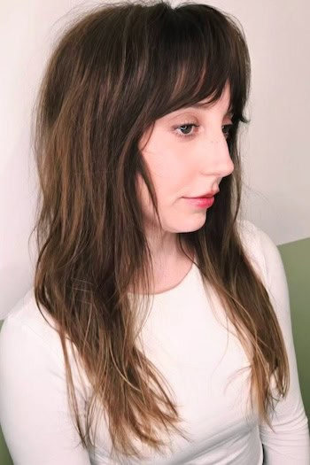 Long Shaggy Layers With Curtain Bangs Hairstyle
