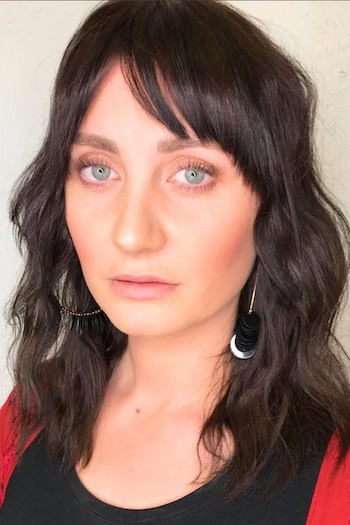 Wavy Medium Shag With Piecey Bangs Haircut