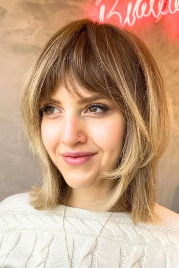 Choppy Layered Long Bob With Bangs Haircut