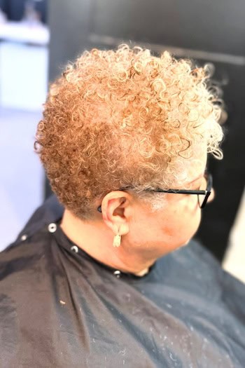 Tightly Coiled Short Curly Pixie Hairstyle