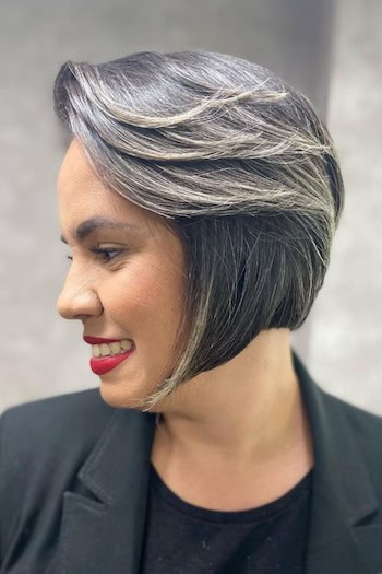 Gray Blended Chin-Length Feathered Bob Hairstyle, side view.