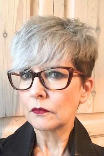 Silver Pixie with Side-Swept Bangs and Undercut Hairstyle