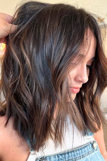 Tousled Brunette Choppy Lob Haircut