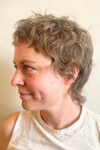 Short Tousled Pixie Shag with Cropped Crown Hairstyle