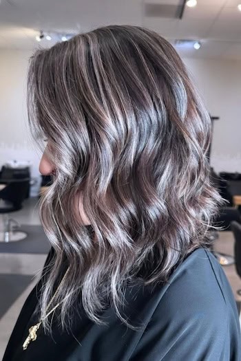 Long Angled Gray Blended Bob Hairstyle
