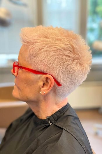 Platinum Blonde Short Pixie Hairstyle, side view.