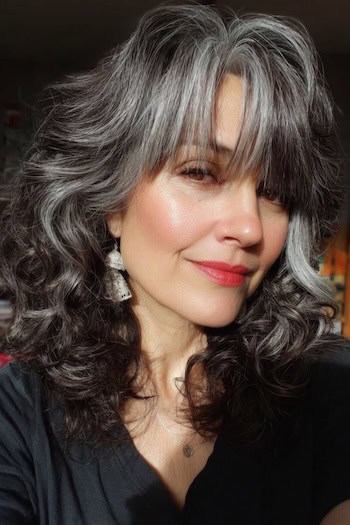 Voluminous Curly Gray Blend with Bangs Hairstyle