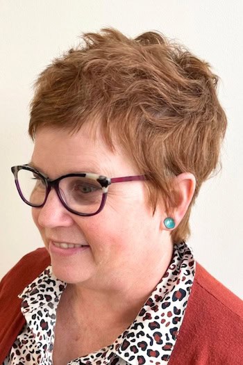 Wavy Textured Brunette Pixie Hairstyle