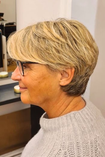 Feathered Pixie with Bangs Hairstyle, side view.