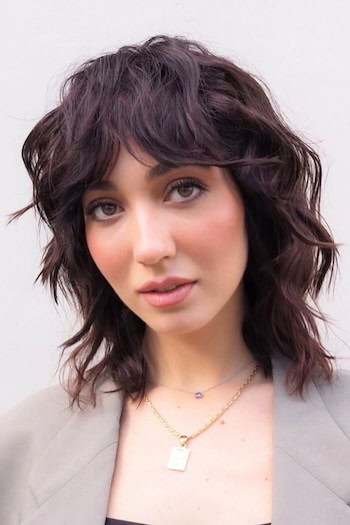 Shaggy Medium Layers With Bangs Haircut