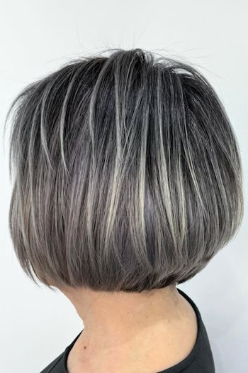 Piecey Gray Highlights on Dark Bob Hairstyle, side view.