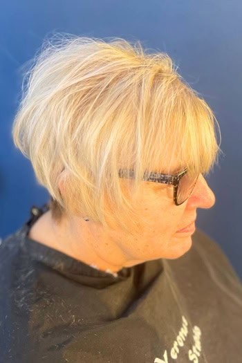Blonde Pixie Bob Hairstyle, side view.