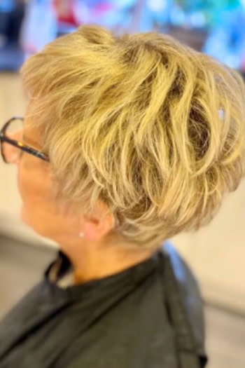 Blonde Tousled Pixie with Volume Hairstyle, side/back view.